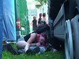 Guy And His Girfriend Are Having Public Sex Between Trucks On Concert